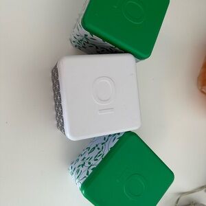 Green and White Decorative Containers